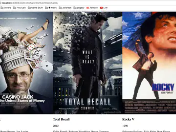 Website with a carousel of vertical movie posters, navigation arrows and titles below